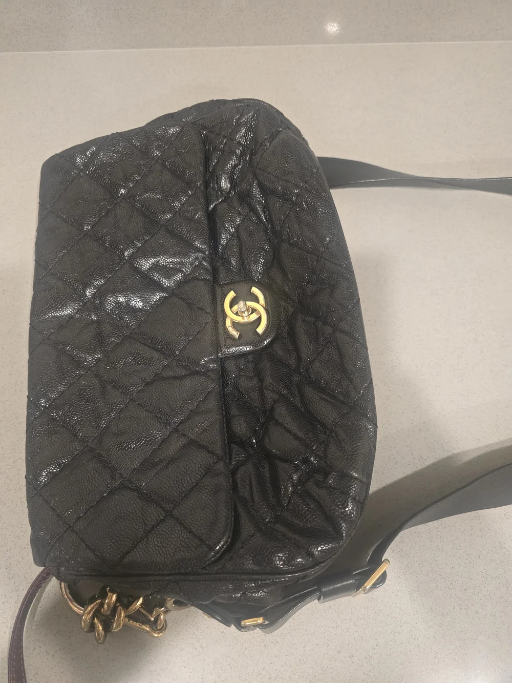 CHANEL Black Quilted Shoulder Bag with Gold Turn-Lock, Long Cross Body Strap